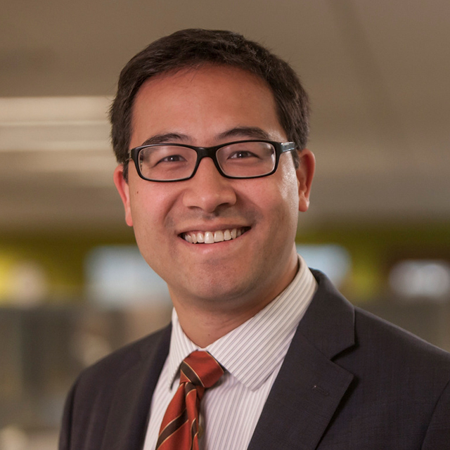 Curt Ostrodka in a brown suit and orange tie