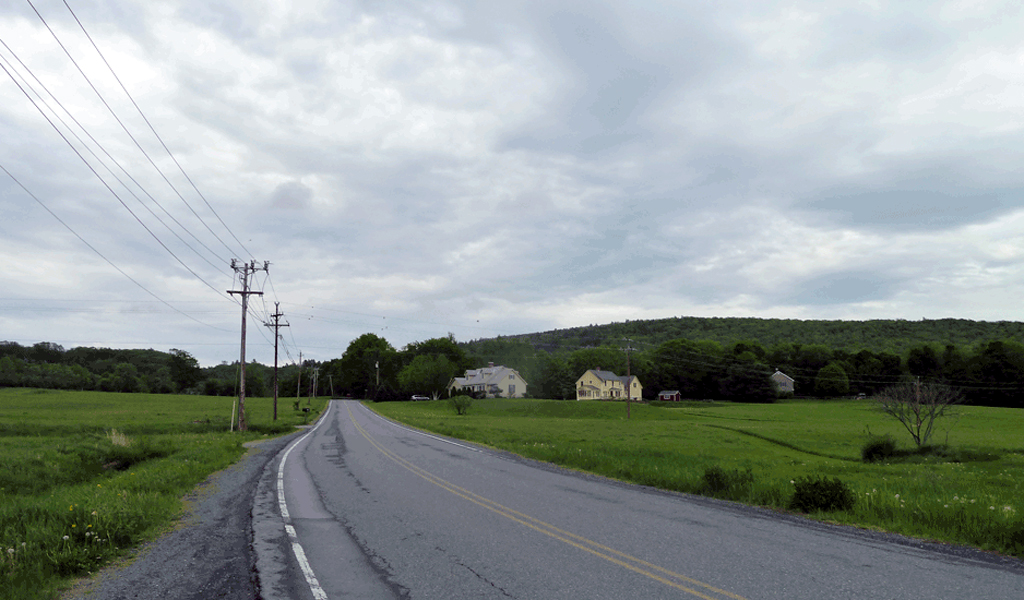 Power lines along the roadway keep communities connected.