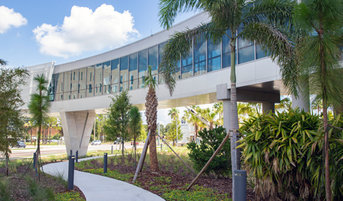 A covered hospital walkway over a road