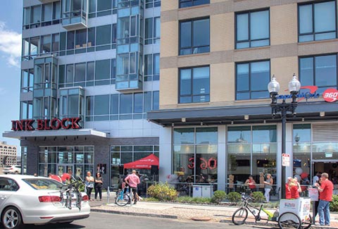 Pedestrian activity at the Ink Block Development in Boston, Massachusetts.