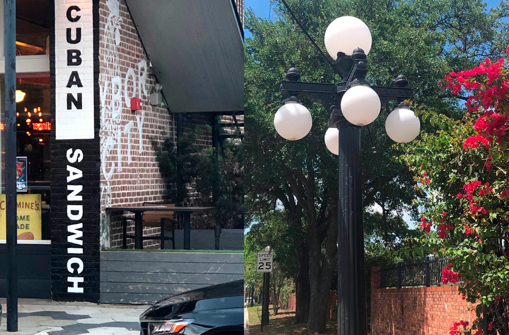 A restaurant in with a brick wall and signage that reads Cuban Sandwich