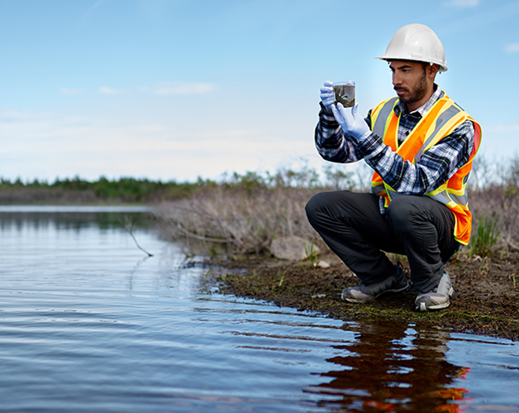 Marine biologist analyzing water test results and algea samples