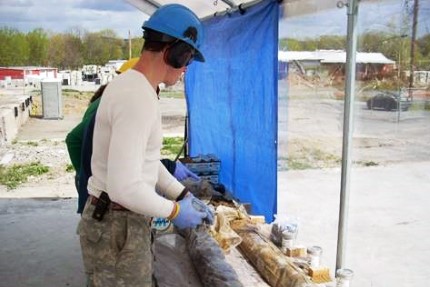 VHB employees inspecting samples collected as part of Site Characterization & Investigation efforts.