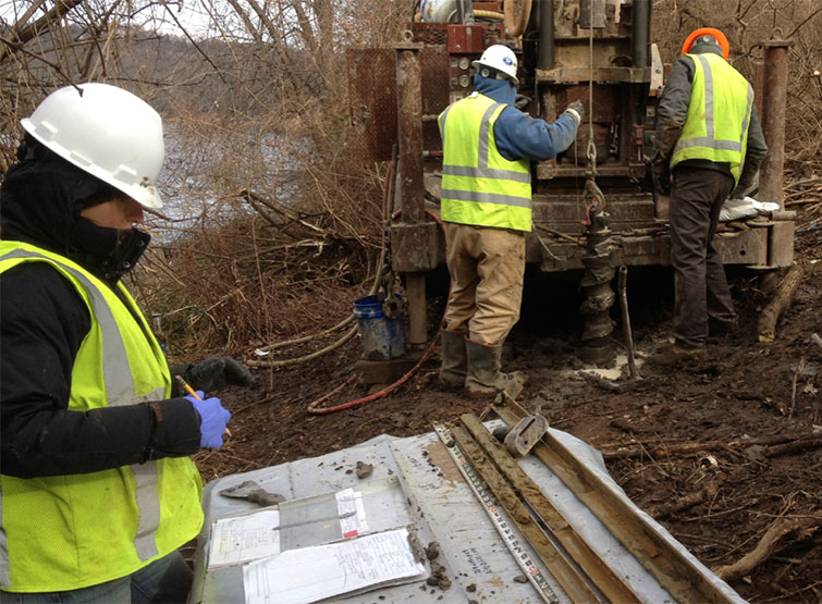 VHB staff conducting split spoon logging and sampling for groundwater.