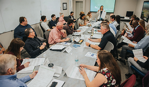 Vision Zero Orlando Task Force meeting with a multidisciplinary team of experts seated around a conference table