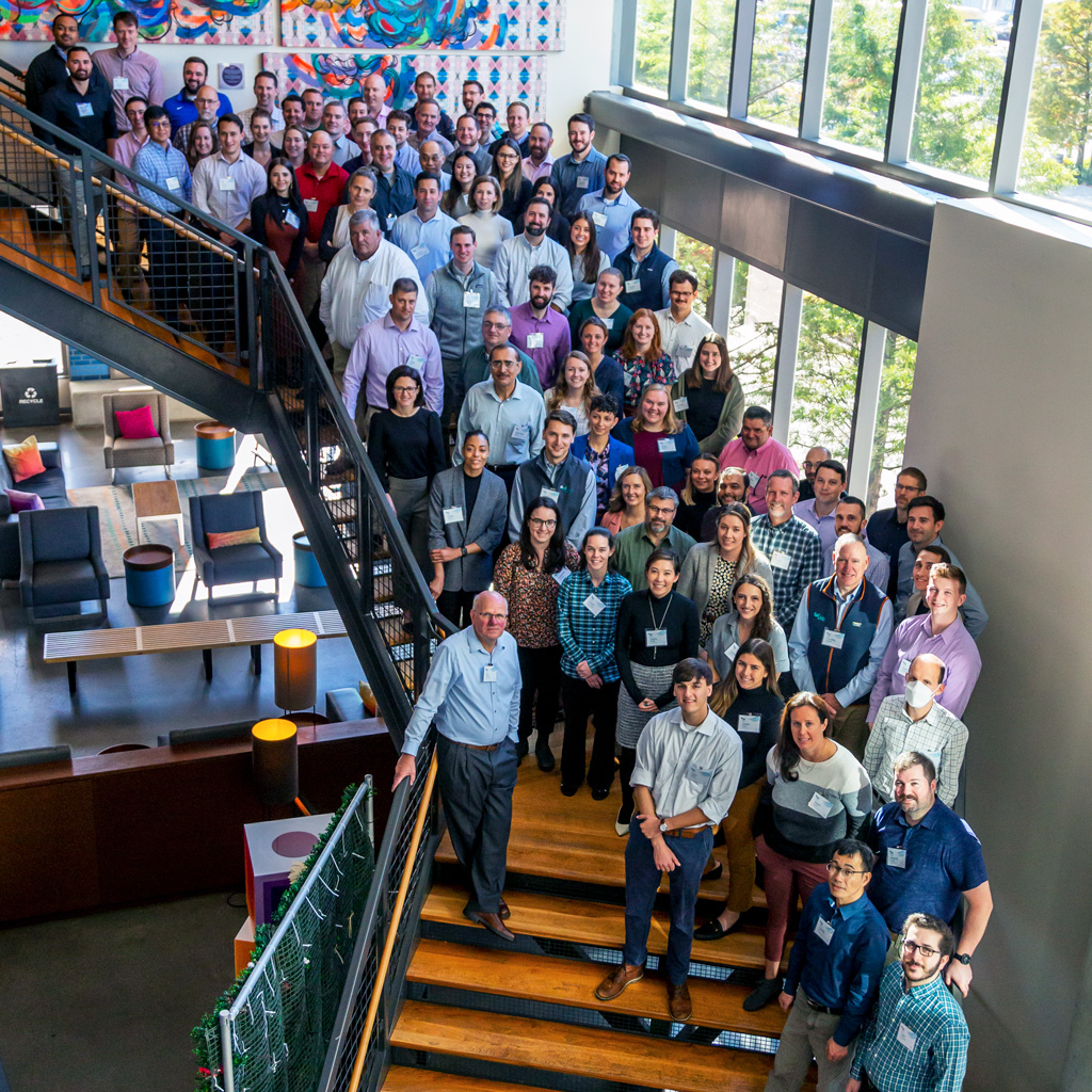 30+ participants of the 2022 Structures Summit together on staircase.