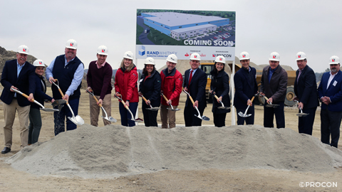 Officials with shovels for groundbreaking event.