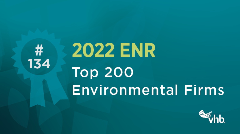 An award ribbon against a teal background with text announcing ENR Top 200 Environmental Firms List