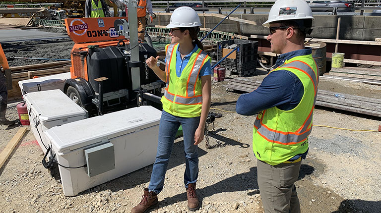 Team members at a bridge construction site