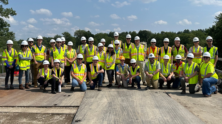 The group of Southeastern New England ITE visitors and VHB and Barletta staff gathered together at the project site.