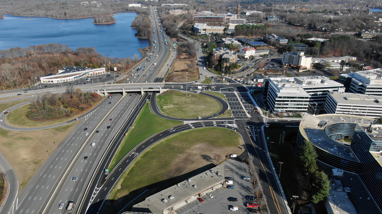 Aerial view of 128/I-95 Route 20 rotary, looking northeast with a report cover thumbnail image in lower right corner