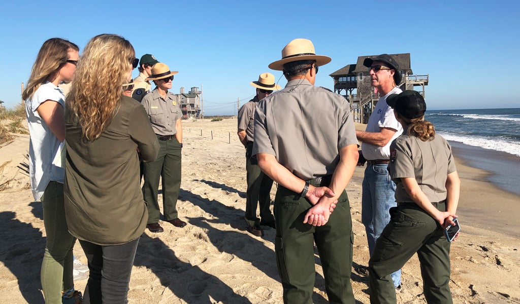 Photo 01: Consultants gather with National Park Service Rangers at Cape Hatteras National Seashore.