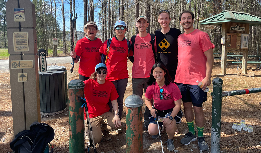 Post-race trail cleanup crew smiles for the camera. 