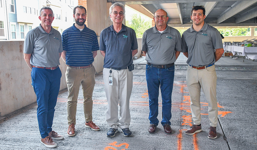 Joe Wanat, Andrew MacPherson, David Wilcock, Jim Long, and Drew Dommel at the topping off ceremony