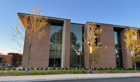 The front facades that shows the building’s floor to ceiling windows.