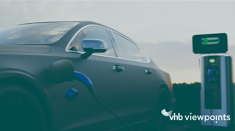 An electric vehicle parked at a charging station.